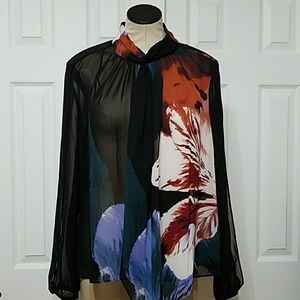 Jennifer Lopez cold shoulder blouse